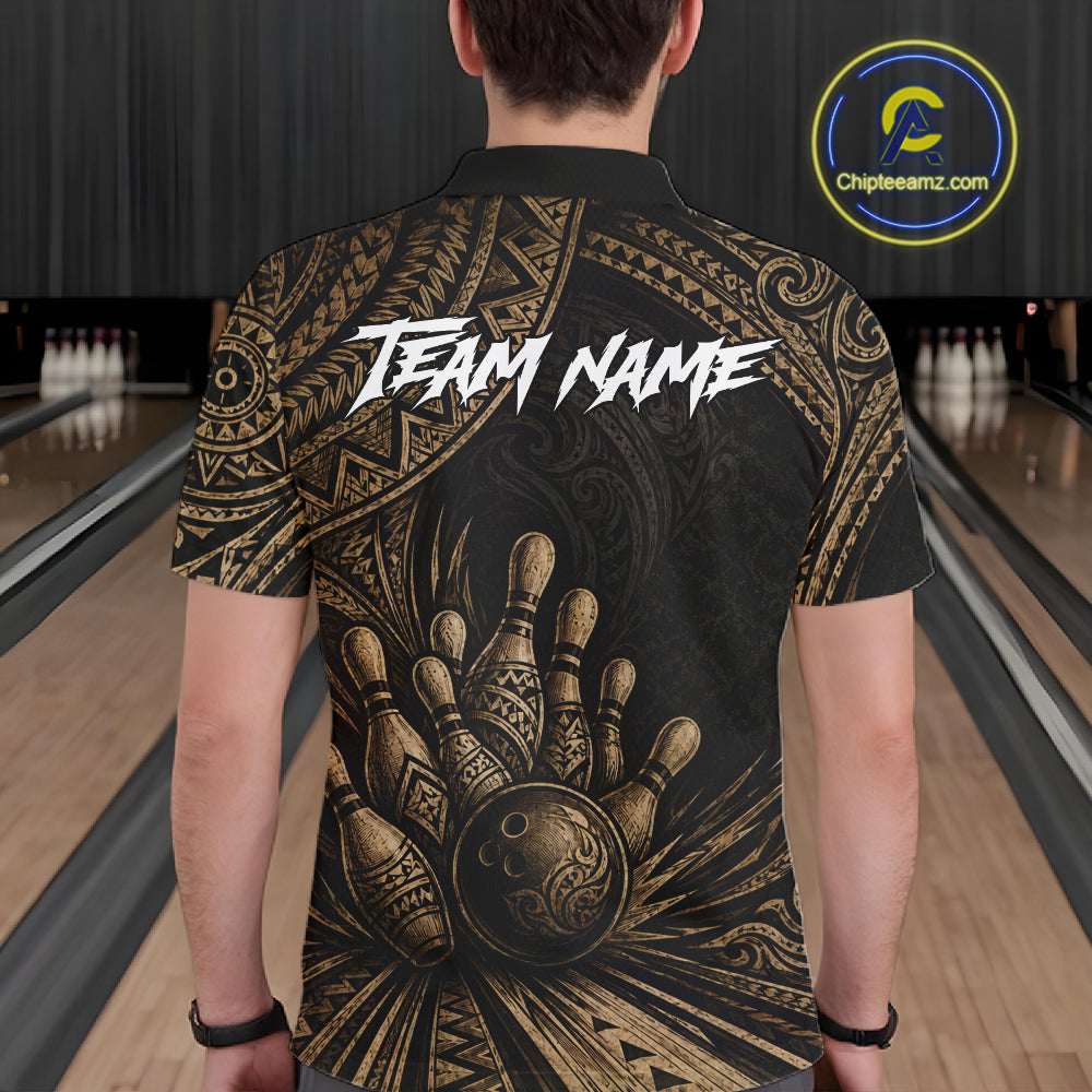A man viewed from behind wearing a black short-sleeve bowling shirt with a large gold bowling pin and ball graphic on the back, white 'TEAM NAME' text across the upper back, and a bowling alley background. A circular 'Chipteeamz.