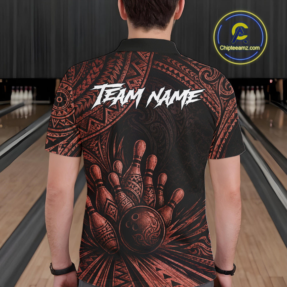 A man viewed from behind wearing a black short-sleeve bowling-themed polo shirt with a tribal-style red and brown graphic of bowling pins and a bowling ball, plus 'TEAM NAME' printed across the back. Bowling alley lanes are visible in the background, and a circular 'Chipteeamz.
