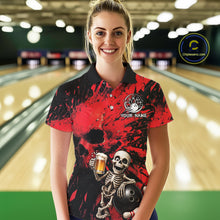Load image into Gallery viewer, Person wearing a red and black bowling shirt with a skeleton design in a bowling alley.