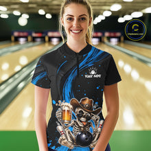 Load image into Gallery viewer, Person wearing a black and blue bowling shirt with a skeleton design in a bowling alley.