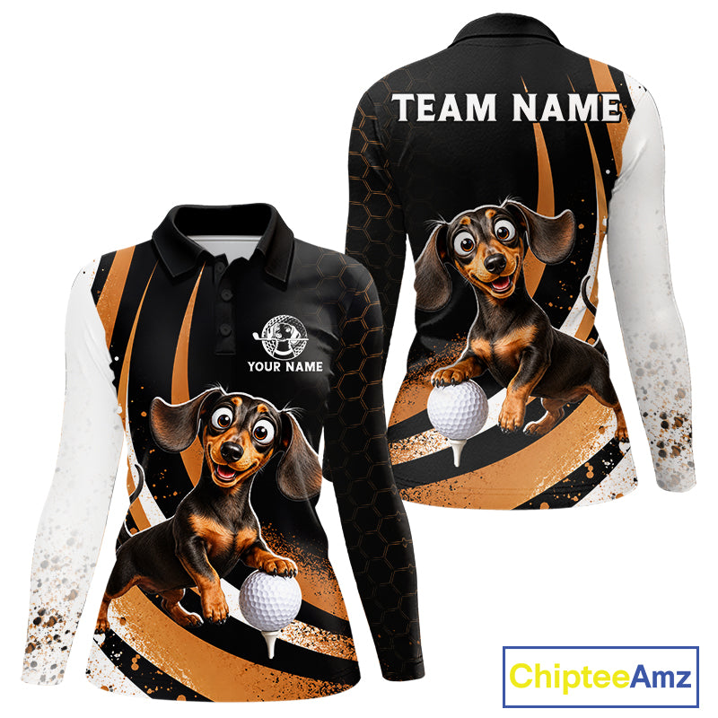 Front and back views of a long-sleeve polo shirt featuring a cartoon dachshund golf dog graphic on a black, orange, and white splatter design. The front shows a polo collar, 'YOUR NAME' placeholder text, and a golf ball graphic.