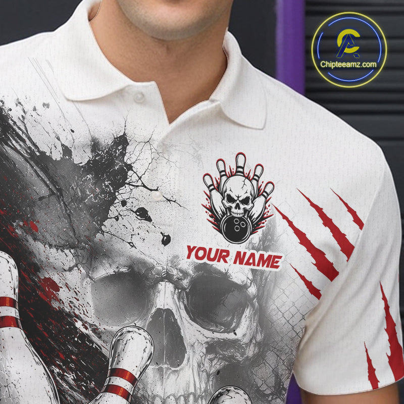 A close-up of a person wearing a white short-sleeve polo shirt with a large skull-and-bowling-pin graphic, red claw-stripe accents, and a customizable name patch on the chest.