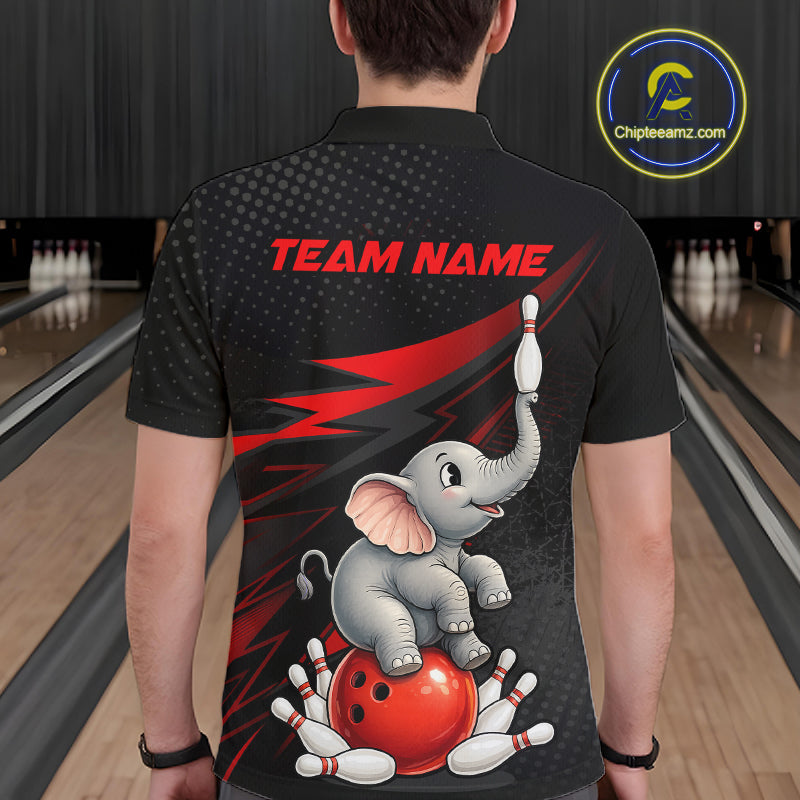 A person viewed from behind wearing a black short-sleeve bowling-themed polo shirt with a large graphic of a gray elephant balancing a white pin on its trunk while sitting on a red bowling ball, with red lightning accents and the text 'TEAM NAME' across the upper back. Bowling lanes are visible in the background, and a circular 'Chipteeamz.