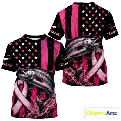 Front and back views of a short-sleeve t-shirt featuring a pink and black patriotic design with stars, stripes, a large rainbow trout graphic, and pink awareness ribbons. The shirt includes customizable text placeholders like 'NAME' and 'YOUR'.