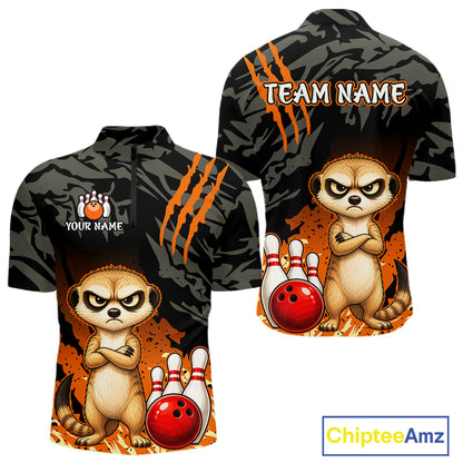 Front and back views of a short-sleeve bowling-themed t-shirt on a white background. The shirt features a black and gray camouflage pattern with orange claw marks, a cartoon meerkat next to a red bowling ball and bowling pins, and customizable text areas reading 'TEAM NAME' and 'YOUR NAME'.