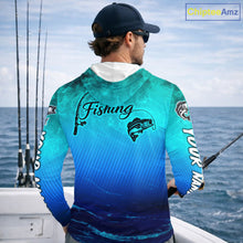 Load image into Gallery viewer, Teal and blue fishing-themed hoodie with a large mouth bass design on a white background.