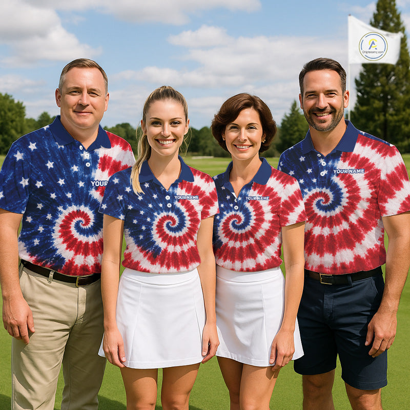 Four people wearing tie-dye shirts with a golf course background