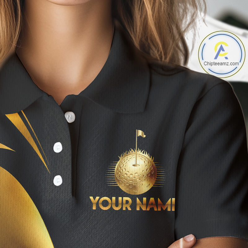 Close-up of golf clubs graphic on Black and Gold womens golf polo