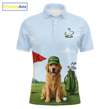 Load image into Gallery viewer, Light blue polo shirt with a golden retriever on a golf course design, featuring a red flag and golf bag.