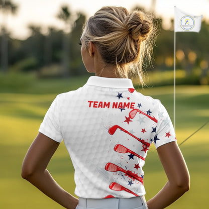 Person wearing a white polo shirt with 'TEAM NAME' on the back, standing on a golf course.