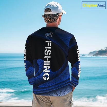 Fisherman on the water wearing custom name blue camo bass fishing long sleeve shirt