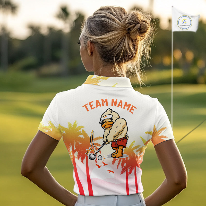 Woman wearing a funny duck womens golf polo with tropical sunset and 'Team Name' text on the back, standing on a golf course.