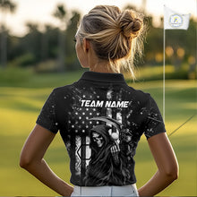 Load image into Gallery viewer, Golfer wearing custom black and white American flag skull reaper golf polo shirt on the course - back view