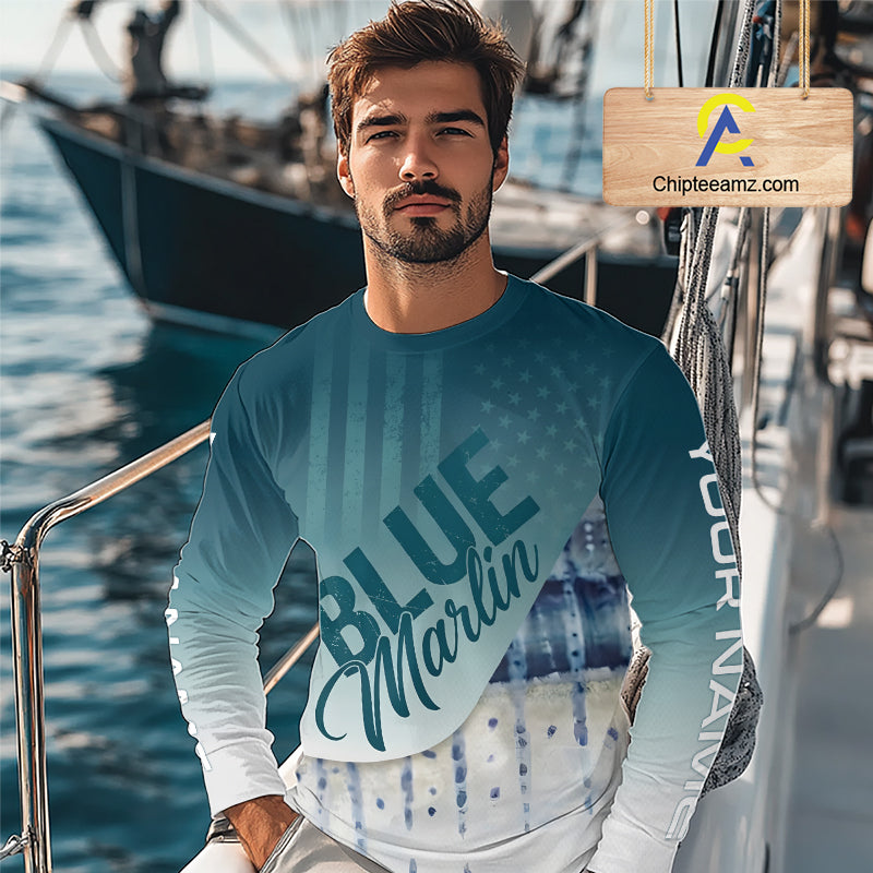 Angler wearing patriotic American Flag Marlin long sleeve fishing shirt on boat