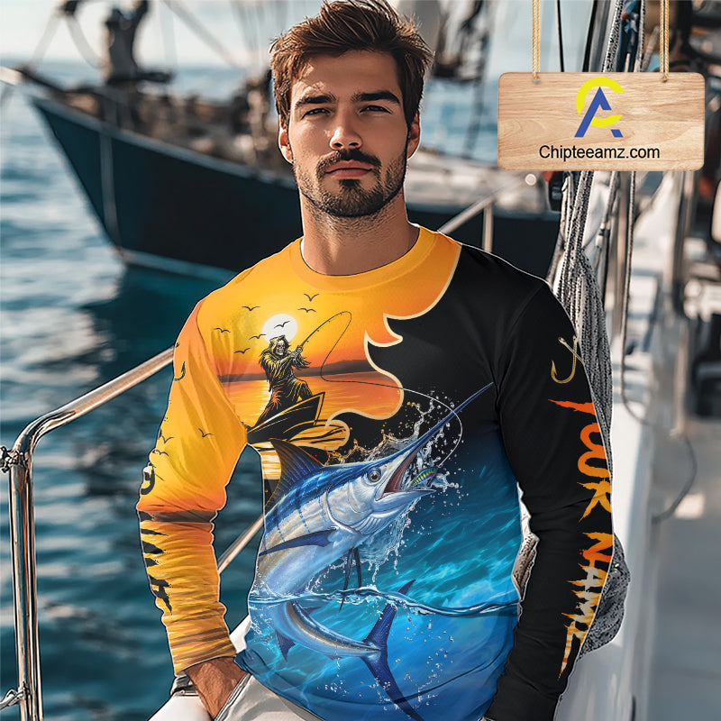 Man wearing a colorful marlin fishing-themed shirt on a boat