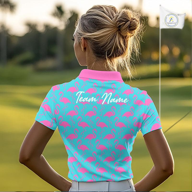 Woman wearing a turquoise polo shirt with pink flamingo pattern and 'Team Name' text on the back, standing on a golf course.
