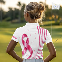 Load image into Gallery viewer, A woman wearing a Breast Cancer Awareness pink ribbon golf polo shirt, standing in the golf course.