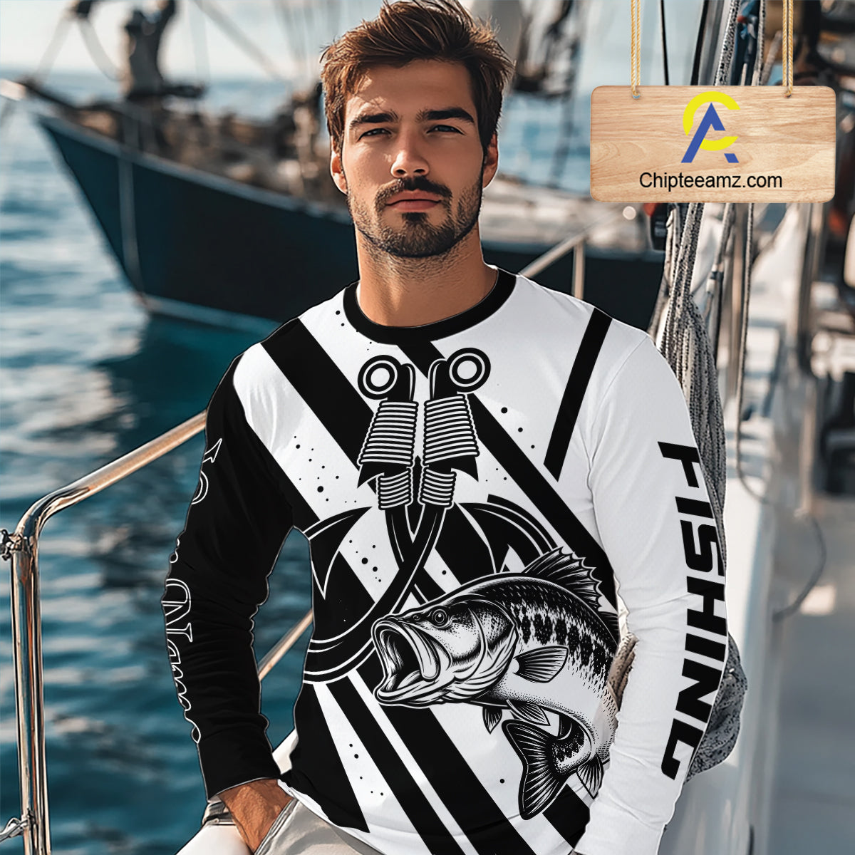 Angler wearing black and white largemouth bass long sleeve fishing shirt on boat
