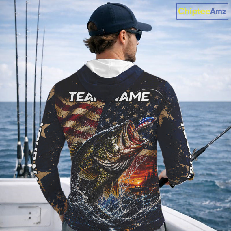 Man on a boat wearing a long sleeve hooded fishing shirt American flag and sunset design.