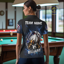 Load image into Gallery viewer, Woman wearing a blue lightning American flag eagle 8 ball billiard jersey beside a pool table front view.