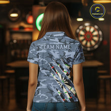Load image into Gallery viewer, Woman wearing personalized blue military camo darts league team jersey polo shirt featuring blue military camouflage artwork, back view.
