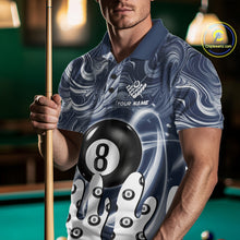 Load image into Gallery viewer, Man wearing a blue marble swirl 8 ball billiard jersey beside a pool table front view.