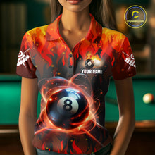 Load image into Gallery viewer, Woman wearing a red 8 ball fire flame billiard jersey beside a pool table front view.