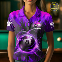 Load image into Gallery viewer, Woman wearing a purple 8 ball fire flame billiard jersey beside a pool table front view.