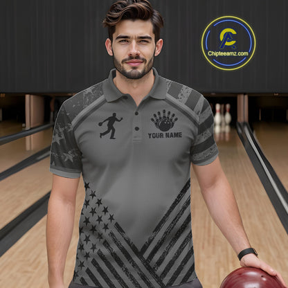Man wearing a grey American flag bowling polo shirt at a bowling alley front view.