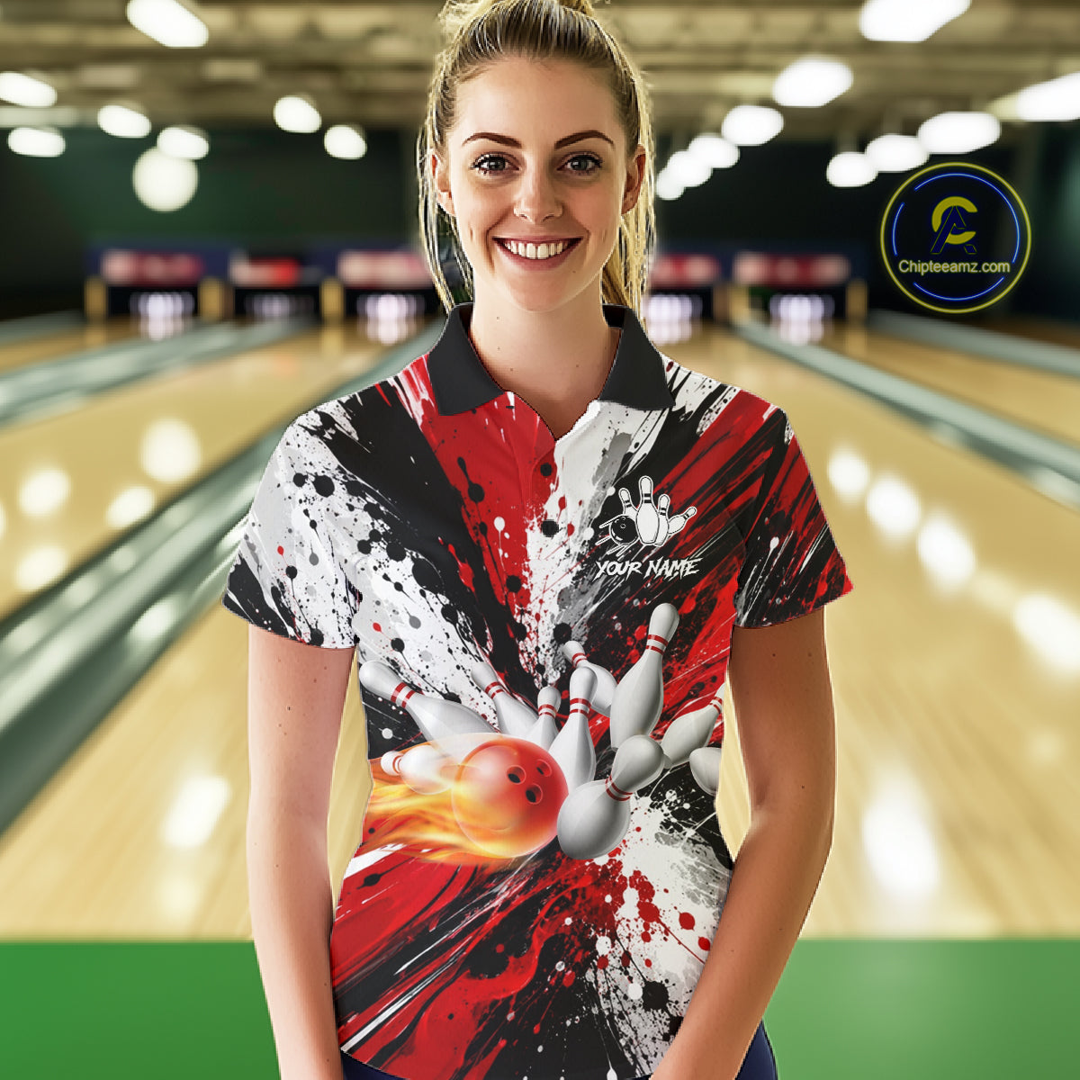 Woman wearing a red splatter bowling polo shirt at a bowling alley front view.