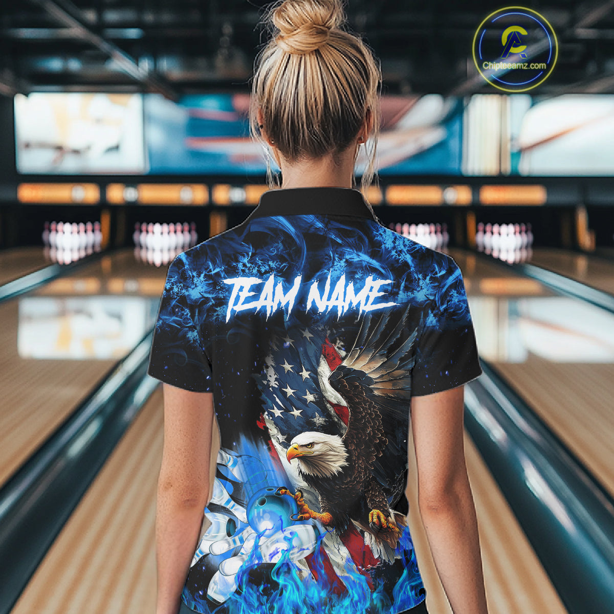Woman wearing blue flame American flag eagle bowling team jersey polo shirt featuring patriotic eagle and American flag artwork, back view.