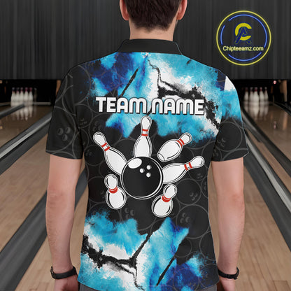 Back view of man wearing a dreamy blue bowling polo shirt inside a bowling alley.