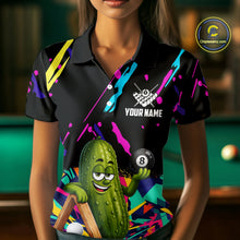 Load image into Gallery viewer, Woman wearing a colorful pickle 8 ball billiard jersey beside a pool table front view.