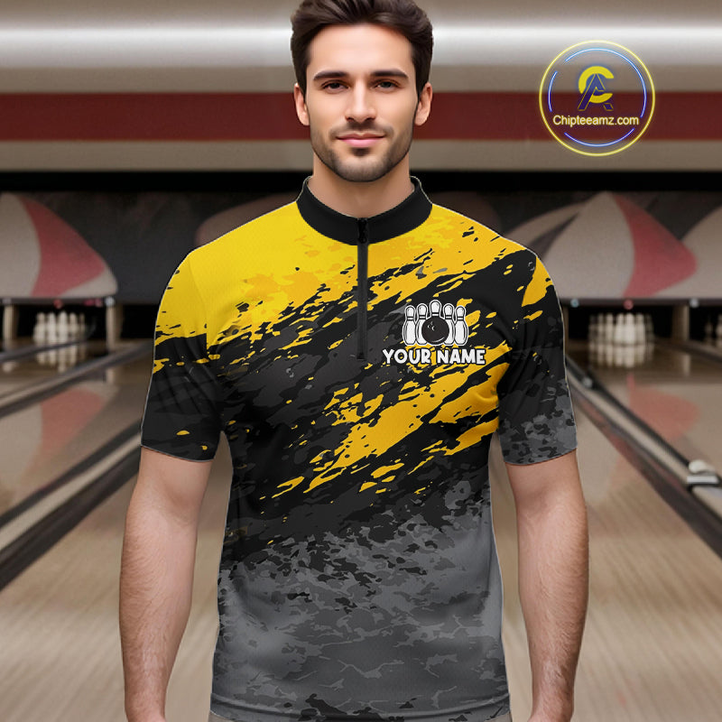 Man wearing a yellow funny banana bowling quarter zip jersey during league competition front view.