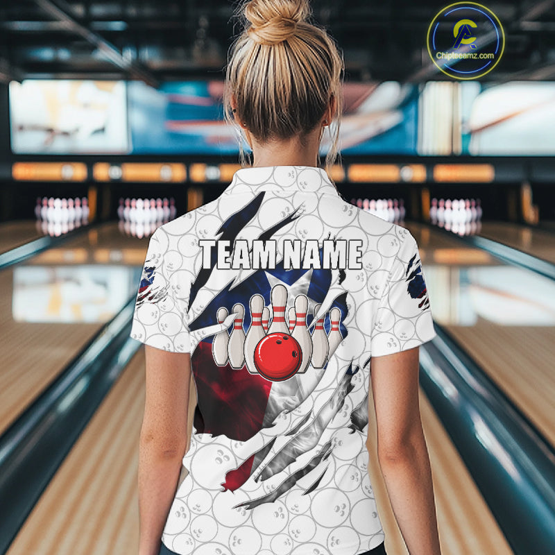 Back view of woman wearing a smoke Texas flag white bowling polo shirt inside a bowling alley.