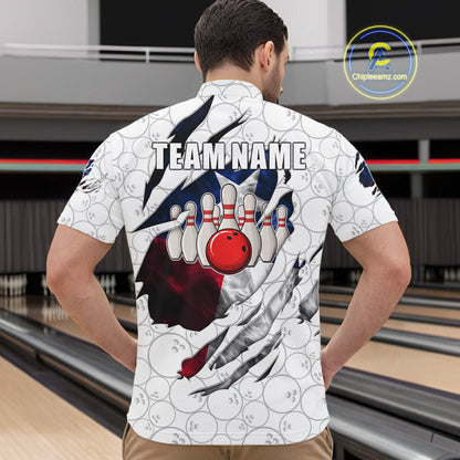 Back view of man wearing a smoke Texas flag white bowling quarter zip shirt in a bowling alley.