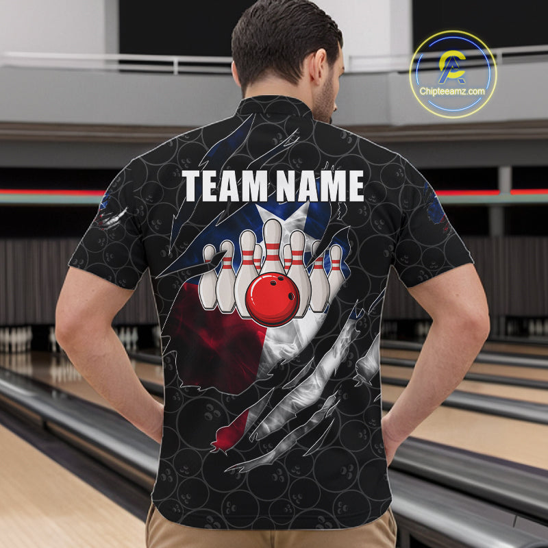 Back view of man wearing a smoke Texas flag black bowling quarter zip shirt in a bowling alley.