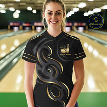 Load image into Gallery viewer, Woman wearing a black and gold crown bowling ball quarter zip jersey during league competition front view.