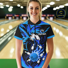 Load image into Gallery viewer, Woman wearing black and blue flame eagle bowling quarter zip shirt front view.
