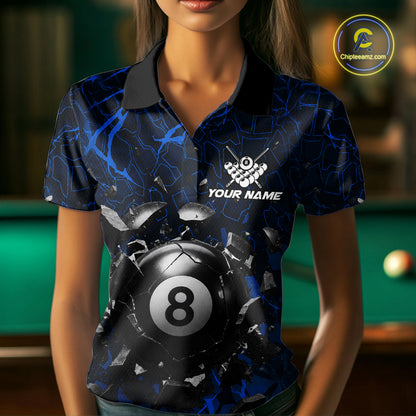 Woman wearing a blue crack 8 ball billiard jersey during pool league play front view.