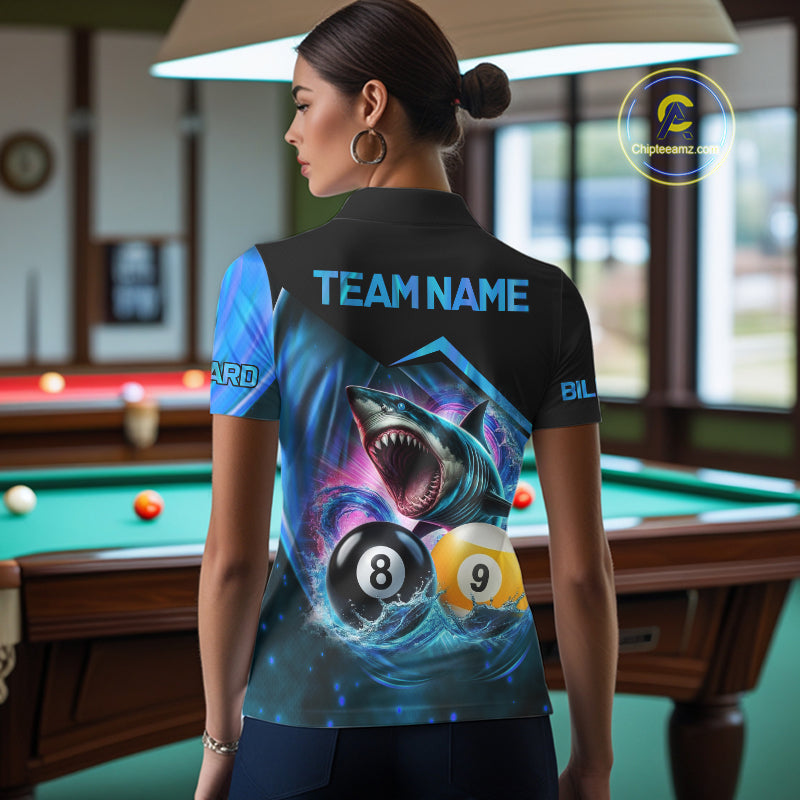Woman wearing blue 8 ball and 9 ball pool billiard shark team jersey featuring shark, 8 ball and 9 ball artwork, back view.