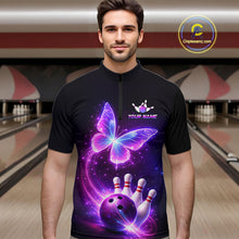 Load image into Gallery viewer, Man wearing a black bowling shirt with a butterfly design in a bowling alley.