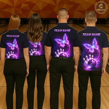 Load image into Gallery viewer, Four people wearing matching shirts with a butterfly design on a bowling alley.