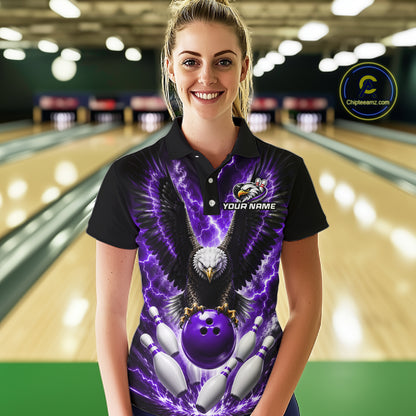 Woman wearing a purple thunder lightning eagle bowling polo shirt at a bowling alley front view.