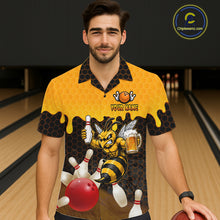 Load image into Gallery viewer, Male model wearing the Black and Yellow Funny Bee Beer Bowling Hawaiian shirt featuring a funny bee, beer mug, black and yellow hexagon pattern and tropical bowling artwork, front view