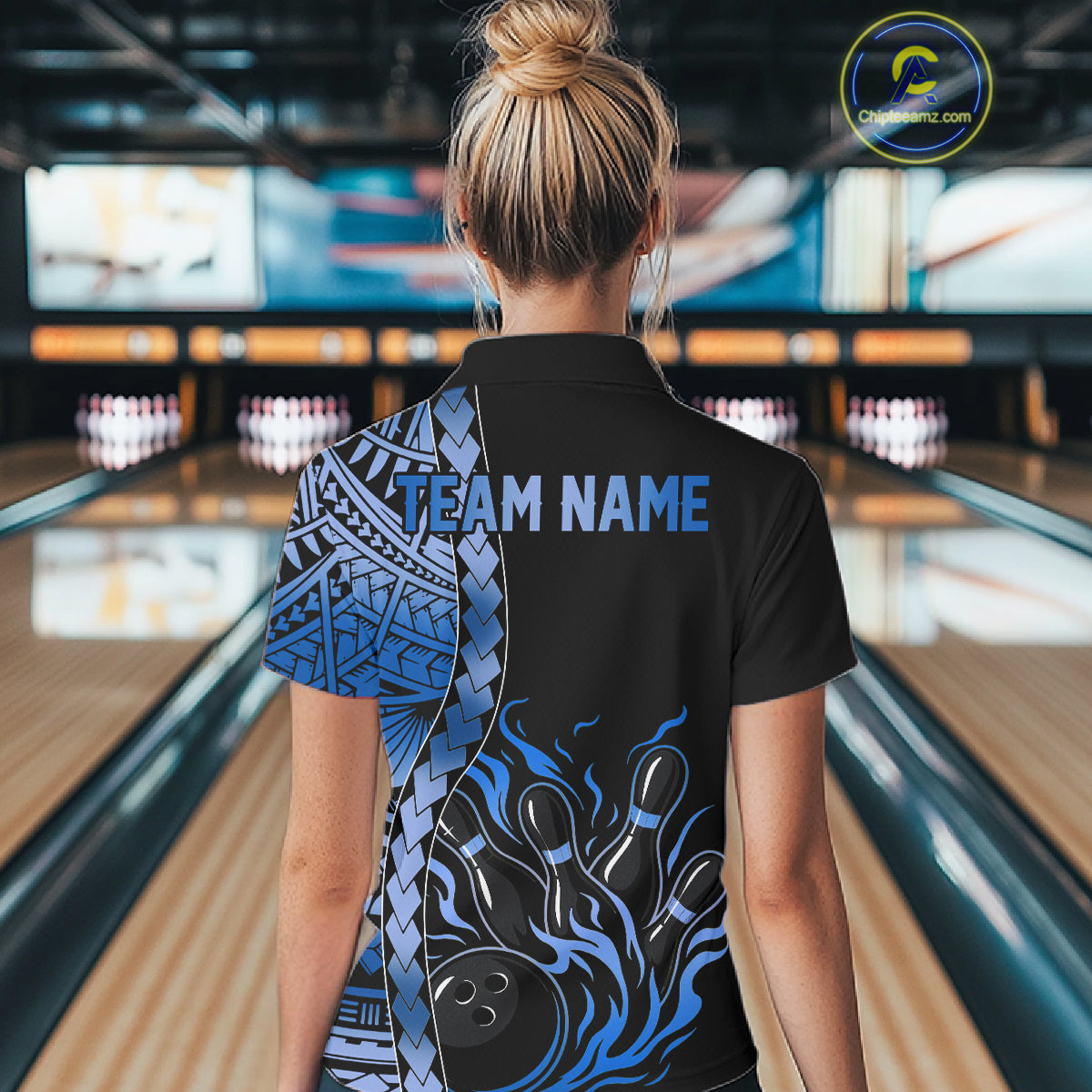 Female bowler in blue tribal bowling polo during league night