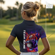 Load image into Gallery viewer, Female golfer wearing colorful tiger golf polo shirt, artistic splatter golf apparel, ladies golf outfit