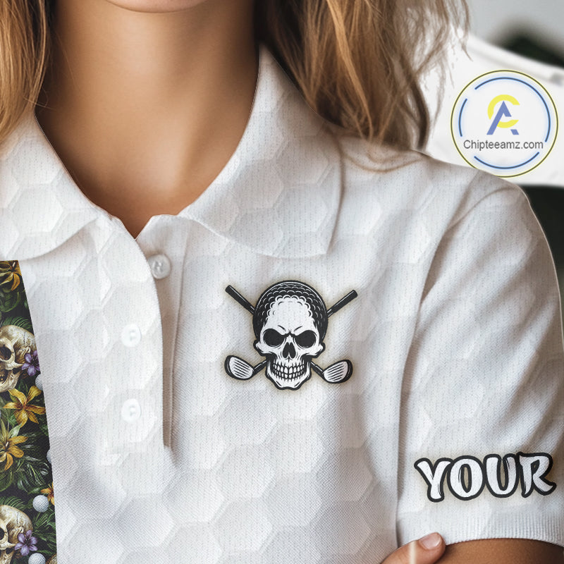 Female golfer wearing tropical skull golf polo on sunny golf course, fashionable golf apparel representing freedom, nature and resort living.